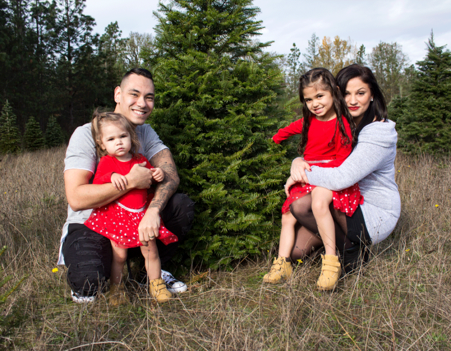 bailey-family-christmas-card-photos-group-photo-sitting-around-a-christmas-tree